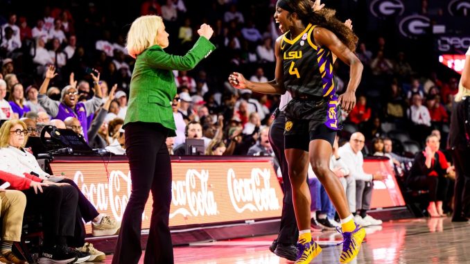 Flau'jae Johnson, LSU guard and Kim Mulkey, LSU head coach